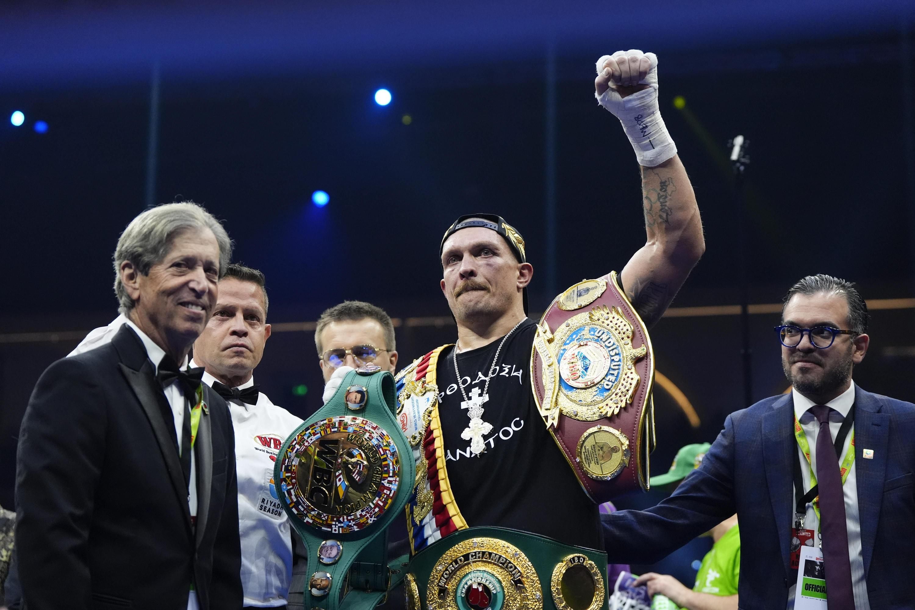 Олександр Усик та Евандер Холіфілд - Леннокс Льюїс порівняв легендарних боксерів